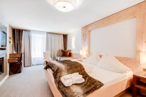 Posteľ alebo postele v izbe v ubytovaní Hotel Albona