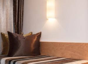 Posteľ alebo postele v izbe v ubytovaní Hotel Albona