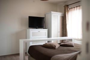 TV a/nebo společenská místnost v ubytování B&B A Dream City spa & Massages