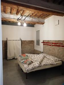 Posteľ alebo postele v izbe v ubytovaní Zucchero sui Baffi- Food Lovers B&B
