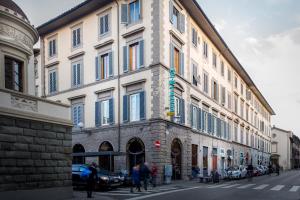 a tall building with people standing in front of it at Adre Majestic View ! Center of Florence ! in Florence