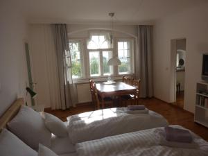Postel nebo postele na pokoji v ubytování Villa Breitenberg