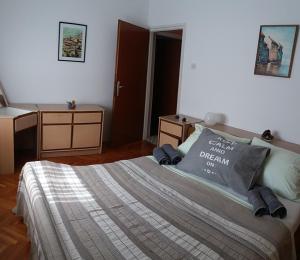 Postel nebo postele na pokoji v ubytování Ana & Marko-Island Ošljak