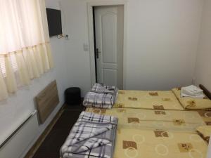 Ένα ή περισσότερα κρεβάτια σε δωμάτιο στο Mico Ficher Kop