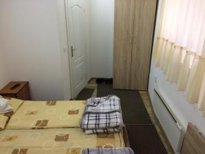 Ένα ή περισσότερα κρεβάτια σε δωμάτιο στο Mico Ficher Kop