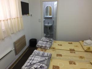 Ένα ή περισσότερα κρεβάτια σε δωμάτιο στο Mico Ficher Kop