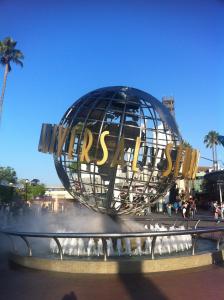 a water fountain in front of the mrs world at Hollywood Hotel in Los Angeles
