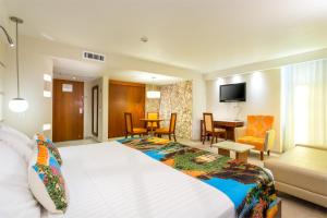 TV a/nebo společenská místnost v ubytování Hotel Dann Cartagena