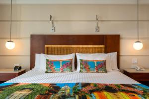 Postel nebo postele na pokoji v ubytování Hotel Dann Cartagena