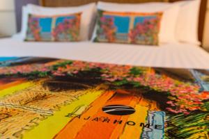 Postel nebo postele na pokoji v ubytování Hotel Dann Cartagena
