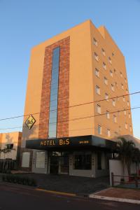 a hotel building with a hotel sign on it at Hotel B&S in Nova Andradina