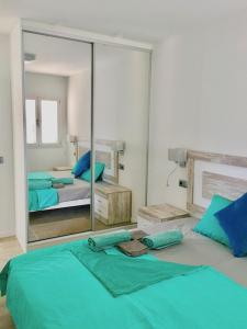 Llit o llits en una habitació de Villa Isla Bonita