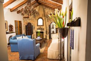 Posezení v ubytování Casa Encantada by Porta Hotels