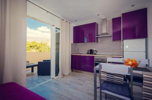 Kuchyňa alebo kuchynka v ubytovaní Mareverde Apartament