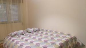 Giường trong phòng chung tại Domus Bracari