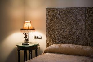 Łóżko lub łóżka w pokoju w obiekcie Hotel Coral Playa