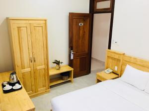 Postel nebo postele na pokoji v ubytování Starhill Hotel