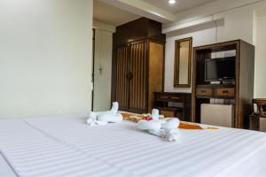 Kuchyň nebo kuchyňský kout v ubytování PorterHouse Beach Hotel