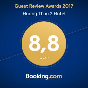 a sign that says guest review awards hong tiao hotel at Huong Thao 2 Hotel in Ha Giang