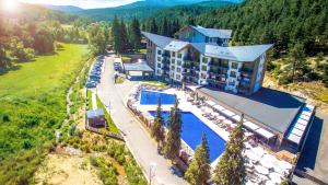 an aerial view of a hotel with a swimming pool at Hotel Arte SPA & Park in Velingrad