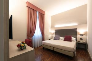 Posteľ alebo postele v izbe v ubytovaní Hotel Campion CityLife