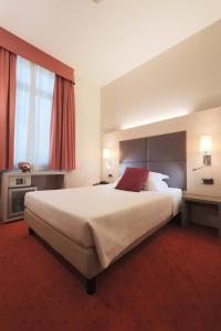 Posteľ alebo postele v izbe v ubytovaní Hotel Campion CityLife