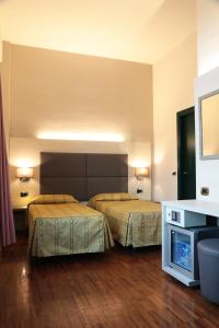 Posteľ alebo postele v izbe v ubytovaní Hotel Campion CityLife