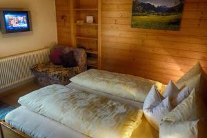 Postel nebo postele na pokoji v ubytování Apart Alpensonne