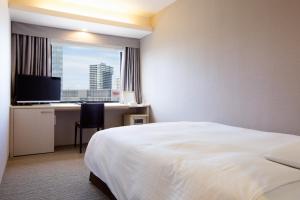 TV a/nebo společenská místnost v ubytování Kawasaki Nikko Hotel