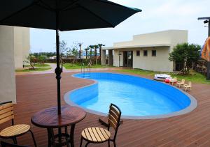 Bazén v ubytování Comma&Spa Resort nebo v jeho okolí