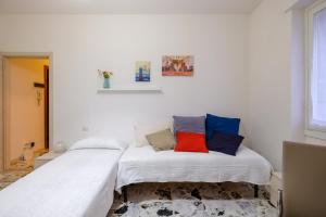 Postel nebo postele na pokoji v ubytování The Best Rent - Ripamonti Apartment