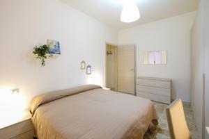 Postel nebo postele na pokoji v ubytování The Best Rent - Ripamonti Apartment