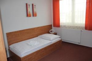 Letto o letti in una camera di Hotel Olympionik