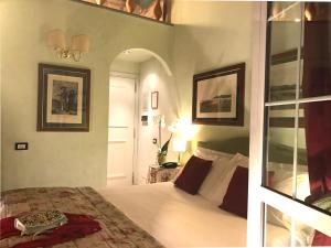 a bedroom with a bed in a room at JOIVY Together Florence Secret Nest in Florence