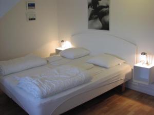 Postel nebo postele na pokoji v ubytování Skagen Room
