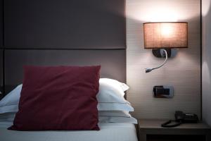 Posteľ alebo postele v izbe v ubytovaní Hotel Campion CityLife