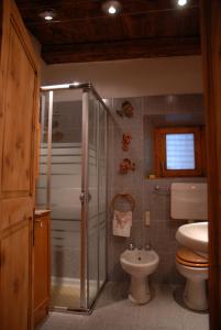 Ванна кімната в Casetta Villa