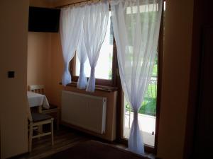 Telewizja i/lub zestaw kina domowego w obiekcie Willa Górski Widok
