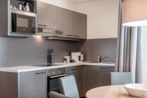 Kuchyň nebo kuchyňský kout v ubytování Apartmenthaus Enzian Hochsölden