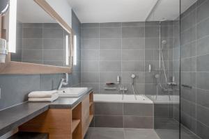 Koupelna v ubytování Apartmenthaus Enzian Hochsölden + 21 fotografií