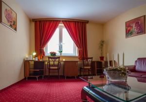 Posedenie v ubytovaní Hotel West