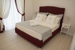 A bed or beds in a room at B&B Pompei Passion