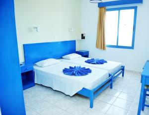 Postel nebo postele na pokoji v ubytování Tasmaria Aparthotel