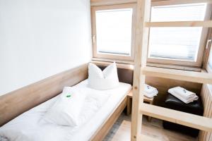 Postel nebo postele na pokoji v ubytování Hotel Palko
