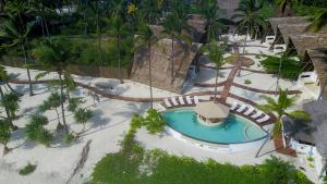 an overhead view of a pool at a resort at Baladin Zanzibar Beach Hotel in Michamvi