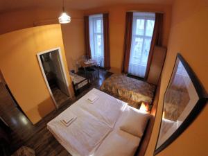 Postel nebo postele na pokoji v ubytování Pension Madara