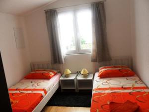 Posteľ alebo postele v izbe v ubytovaní Apartments Nena - Trogir