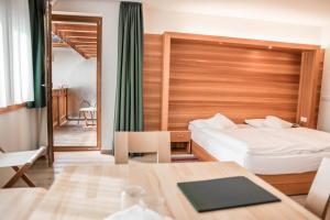 Postel nebo postele na pokoji v ubytování Hotel La Villa