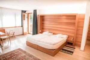 Postel nebo postele na pokoji v ubytování Hotel La Villa