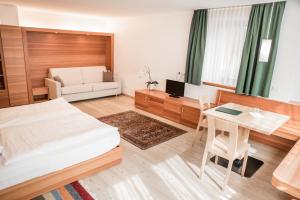 Postel nebo postele na pokoji v ubytování Hotel La Villa